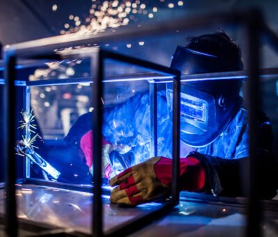 man welds at the factory. High quality photo